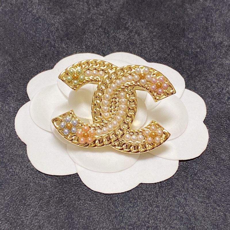 Ch*el brooches
